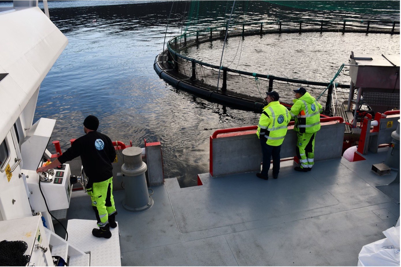 Fish feeding operation at Korshavn Havbruk sea site